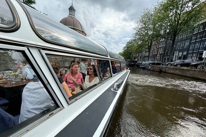 Amsterdam Cheese and Wine Canal Cruise - On-board vibe: quiet canal time with narration