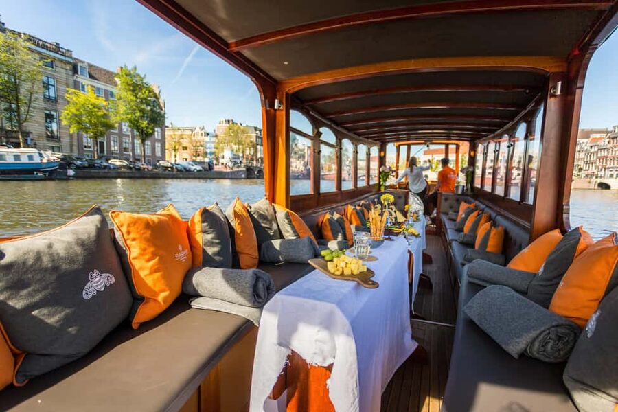 Amsterdam: Classic Boat Cruise with Optional Cheese & Wine - Photo Opportunities and Comfort: Covered Views Beat Guesswork