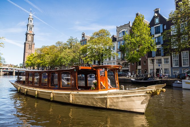 Amsterdam Classic Saloon Boat Cruise with Drinks and Cheese - A one-hour canal cruise that actually fits real schedules