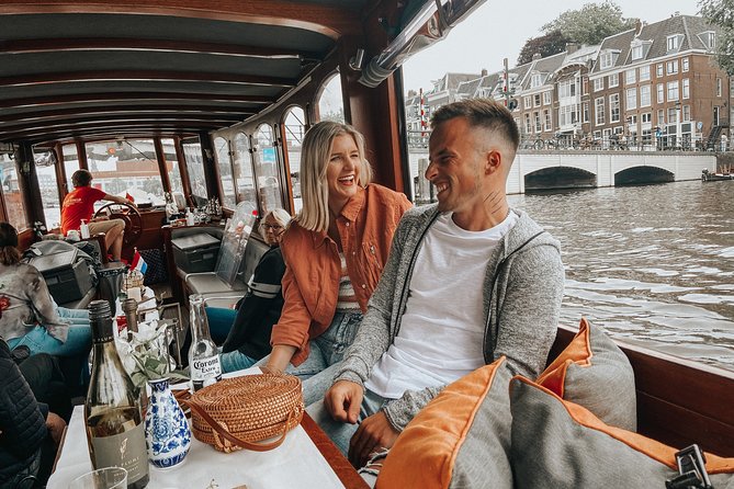 Amsterdam Classic Saloon Boat Cruise with Drinks and Cheese - Magere Brug (Skinny Bridge) and the Jordaan: the canal angles you’ll remember