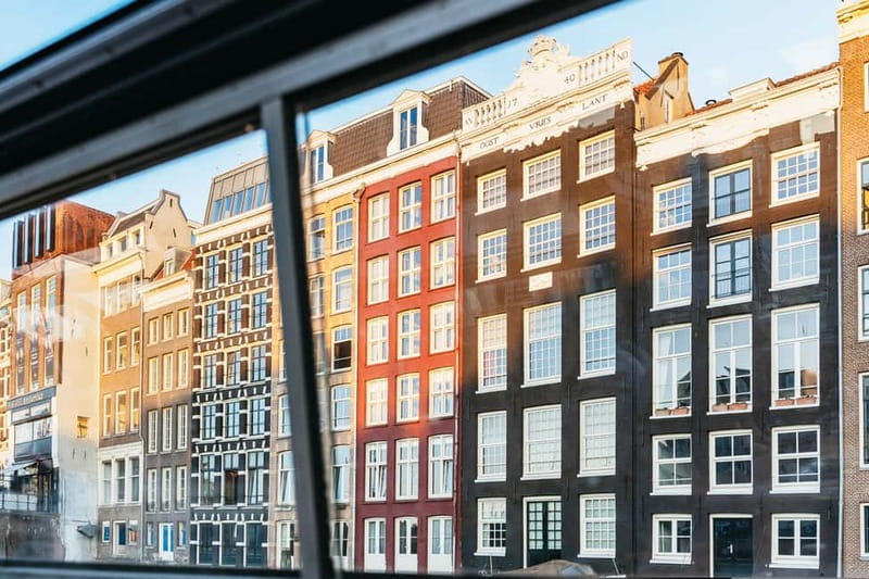 Amsterdam: Cozy Cheese & Wine Cruise Tasting Experience - Inside the heated boat: comfort, service, and a real night out