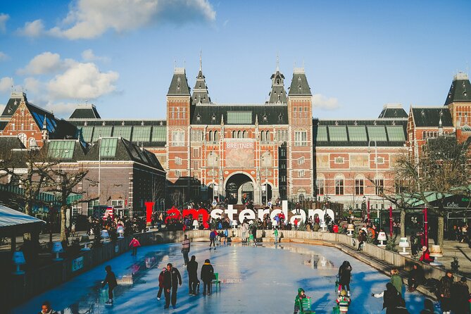 Amsterdam Day Trip from Brussels With Cheese, Clogs and Windmills - De Gooyer windmill and the best kind of photo stop