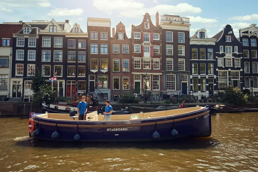 Amsterdam: Evening Candle Light Cruise With Wine & Cheese - How the guide team keeps it fun, not scripted