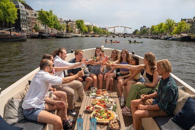 Amsterdam: Evening Candle Light Cruise With Wine & Cheese - What you’ll see: Red Light sights, NEMO, and the UNESCO canal system