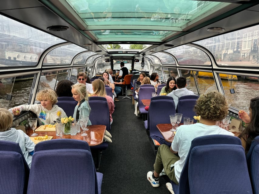 Amsterdam: Luxury Cheese & Wine Canal Cruise - Atmosphere: intimate mood with a story-driven guide