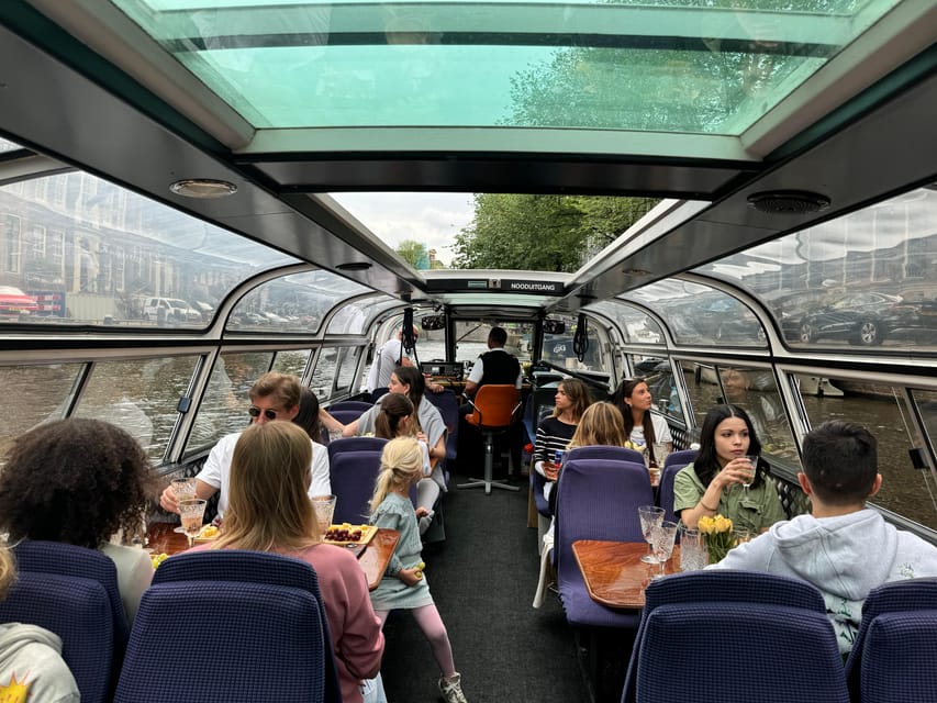 Amsterdam: Luxury Cheese & Wine Canal Cruise - The boat ride: traditional canals, iconic Amsterdam vibes