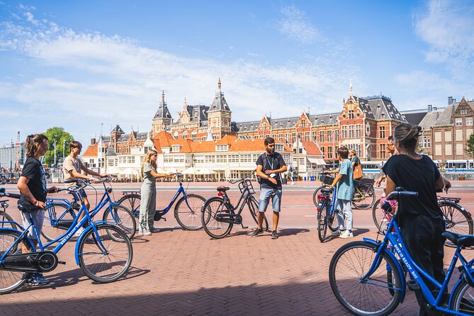 Amsterdam Small-Group Bike Tour With Canal Cruise, Drinks, Cheese - Meet at Nieuwezijds Voorburgwal, then get moving