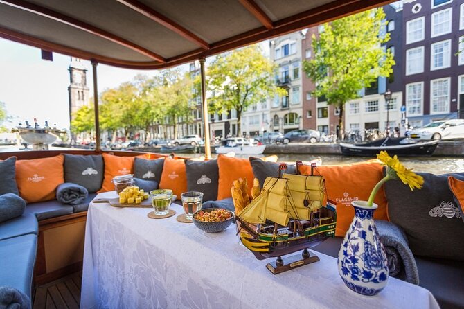 Amsterdam Small-Group Bike Tour With Canal Cruise, Drinks, Cheese - Museumplein, parks, and the city’s green reset