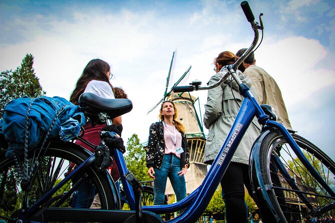 Amsterdam Small-Group Bike Tour With Canal Cruise, Drinks, Cheese - From Amsterdam Centraal to De Gooyer Windmill: your quick route to icon-level Amsterdam
