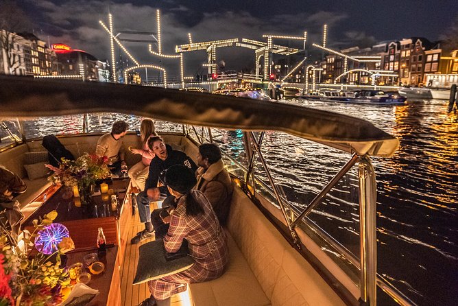 Amsterdam Small-Group Evening Canal Cruise Including Wine, Craft Beer, Cheese - The boat experience: comfort, quiet motor, and good seating