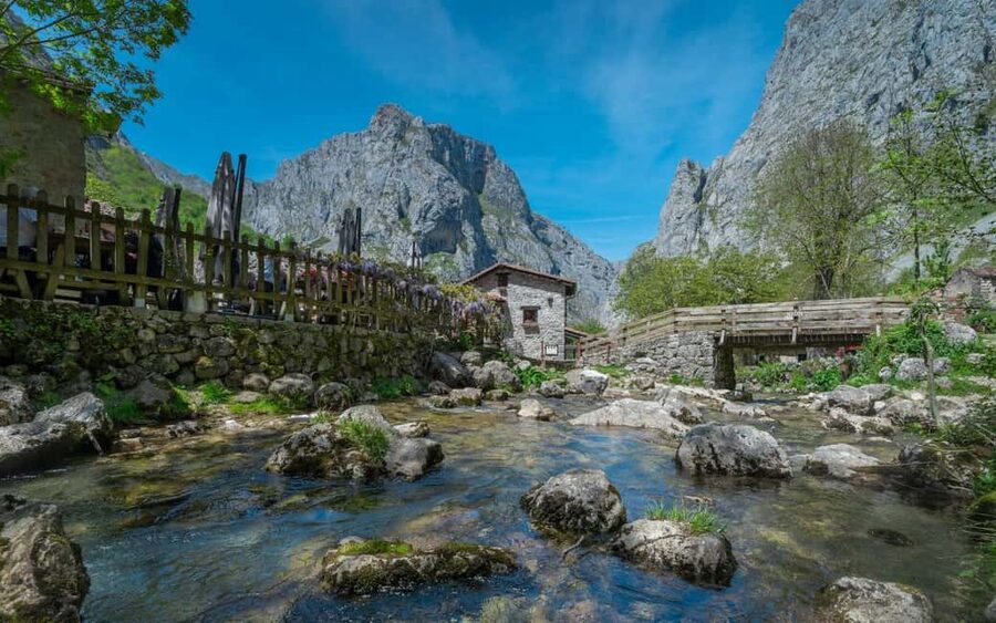 Bulnes: Excursion with funicular and Cabrales cheese cave in the Picos de Europa - Arriving in Bulnes: off-grid village time and Picu Urriellu views