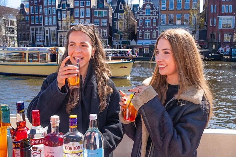 Cheese & Drinks Guided Amsterdam Boat Tour, All Inclusive - The guide experience: stories that make you look twice at the canals