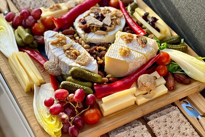 Cheese platter by Boat on Lake Thun, Interlaken - Key highlights to notice before you book