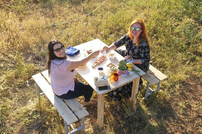 Cretan Farm Tour with Cheese-Making, Olive Oil Tasting & Picnic - The picnic lunch: Cretan delicacies, garden produce, and raki