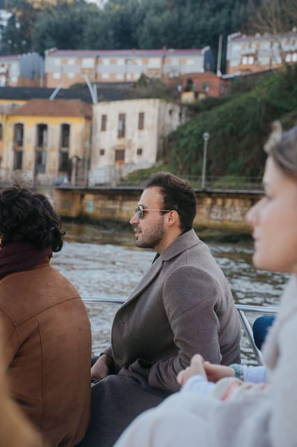 Douro River Cruise with Cheese & Tonic Porto in a Sailboat - Ribeira at golden hour: Porto’s riverfront in motion