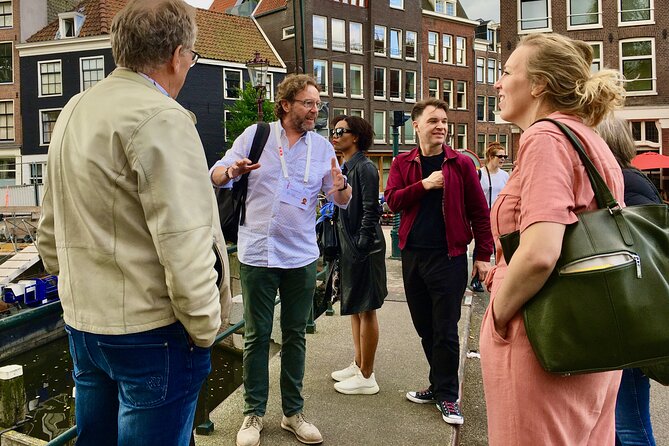 Exclusive Cheese Walk & Dutch Wine Discovery - Spui Book Market meeting: where the tour starts with a local vibe