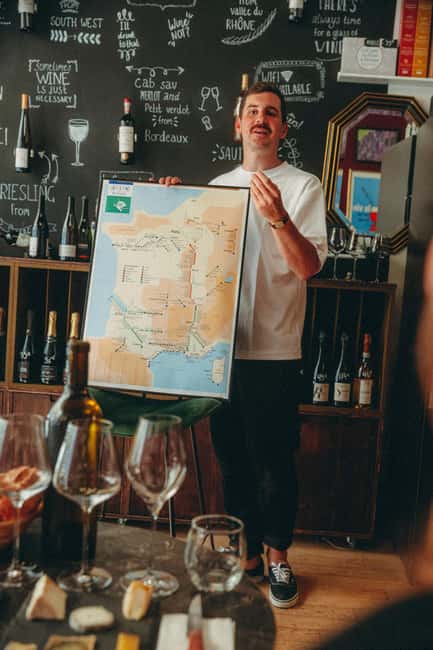 French wine & Champagne & cheese tasting - back on GYG! - Secret Wine Door: A Paris shop tasting that feels personal