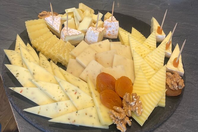 From Basel: Thun Tour, Beatus Caves, Lake Cruise & Cheese - Spiez stroll (with the cheese option) after the caves