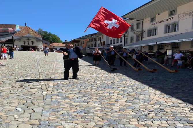 Gruyères Castle, Cheese, and Chocolate Tour | From Zurich - La Maison du Gruyères: watching AOP cheese get made, then tasting it