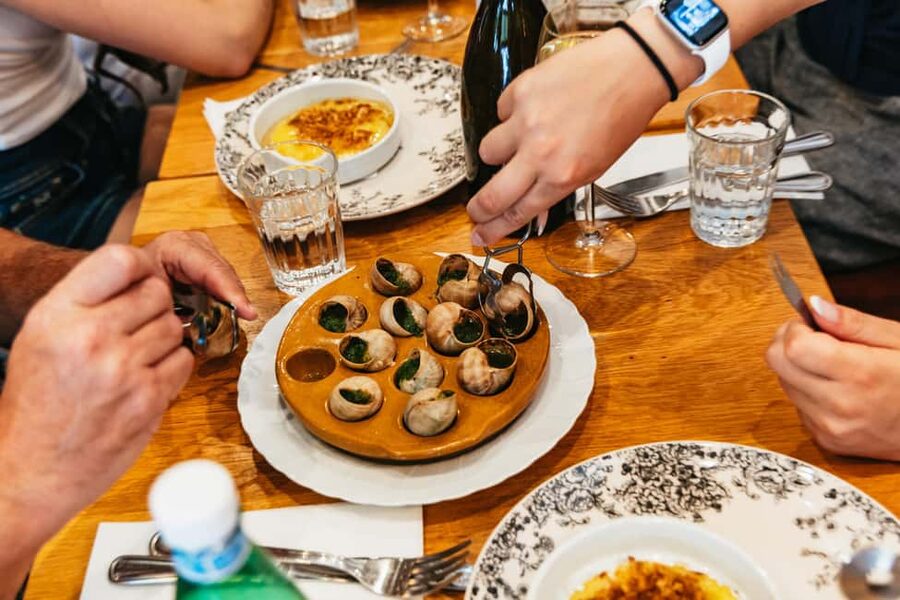 Le Marais Walking Food Tour with Cheese, Wine & Pastries - Guides you might get: Lolla, Dorine, Hugo, and others