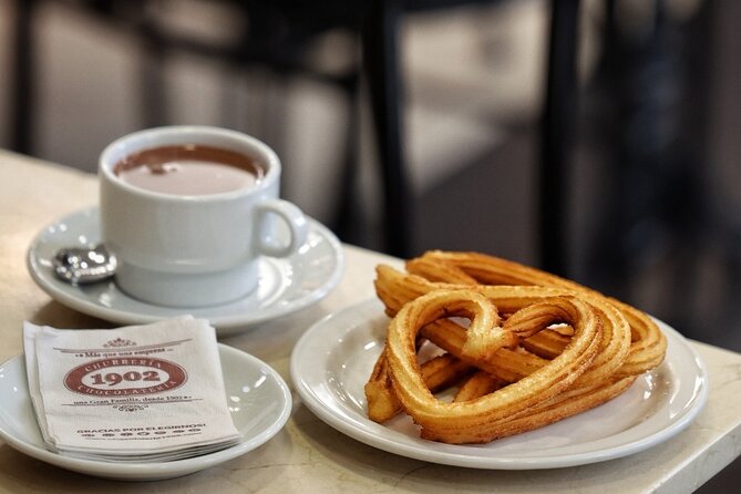 Madrid Bike Tour with Churros and Wine, Ham, and Cheese Upgrade - The Extrem Puro Upgrade: Ham, Cheese, Olive Oil, and Wine