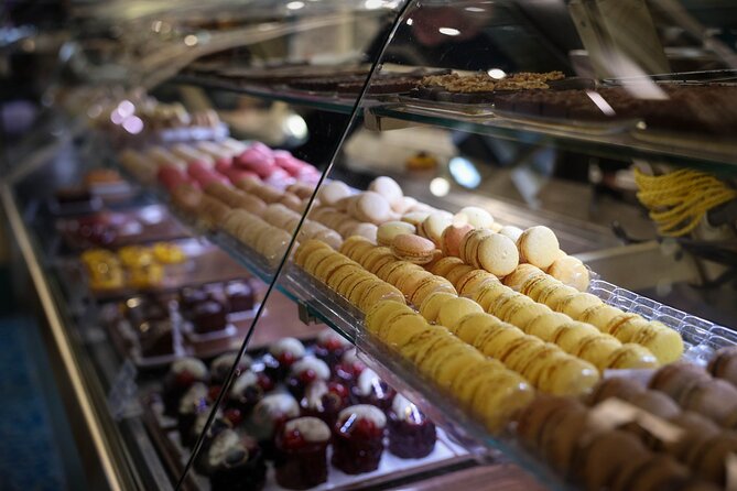 Montmartre Food Tour: The Most Complete Paris Food Experience - Meeting at Place des Abbesses, then walking the Rue des Abbesses
