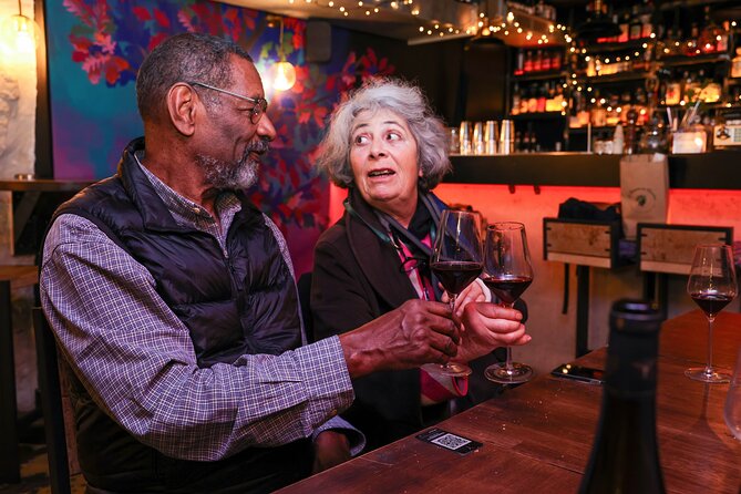 Montmartre Food Tour: The Most Complete Paris Food Experience - Wine tastings, red and white, plus a digestive surprise