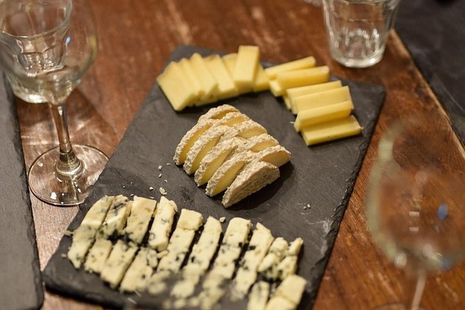 Paris Art of Pairing Cheese and Wine Tasting in a Cheese Cellar - Down Into the Cellar: Ripening Wheels, Cold Air, and Real Atmosphere