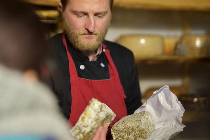 Paris Art of Pairing Cheese and Wine Tasting in a Cheese Cellar - Suit Up and Meet the Cheese-and-Wine Pro