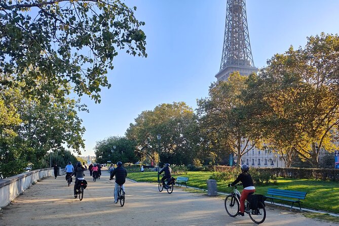Paris : Private electric bike tour with wine and cheese tasting - Biking past the Louvre: royal palace vibes without the full day plan