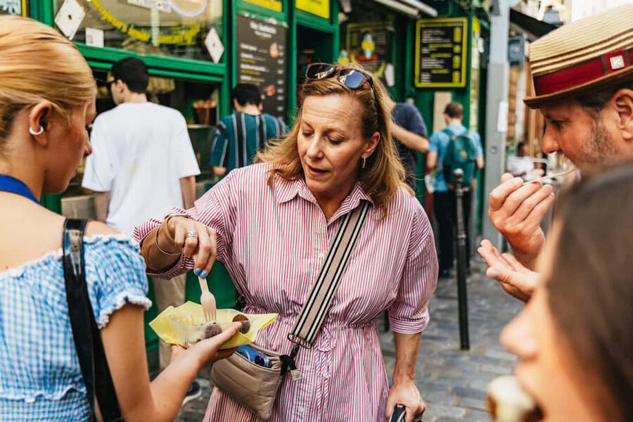Paris: Walking Food Tour with Cheese, Wine and Delicacies - The market detour: where locals shop, not just where tourists pose