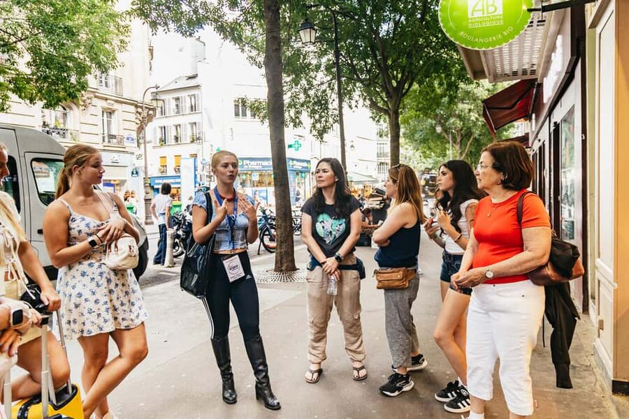 Paris: Walking Food Tour with Cheese, Wine and Delicacies - The restaurant stop: where French specialties slow you down