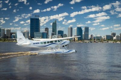 Perth: Scenic Seaplane Tour with Cheese Board & Champagne - The South Perth Foreshore picnic setup (rugs, cushions, and shade)