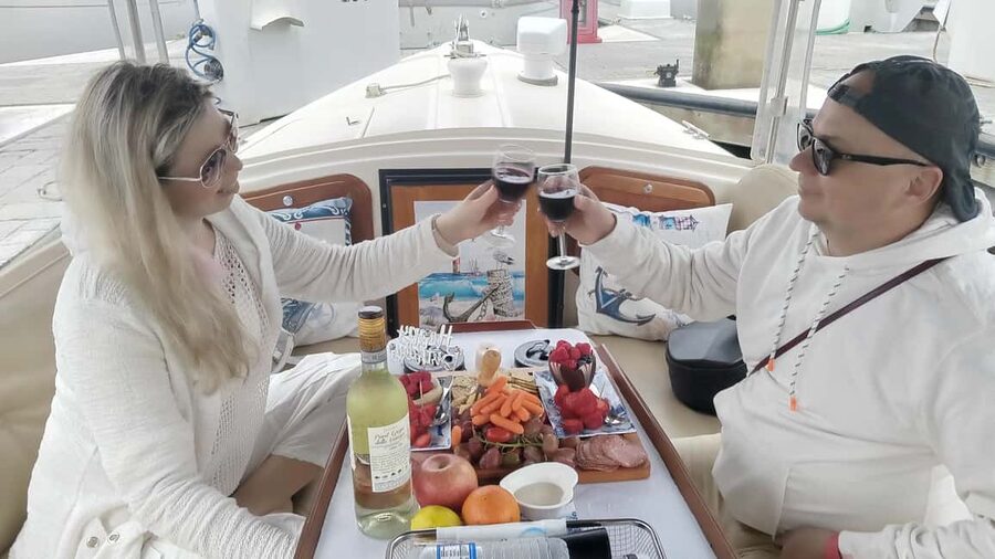 Romantic Boat Cruise with Wine & Cheese or Surprise Dinner - Captain Shaun and the timing game: sunset, sea life, and better photos