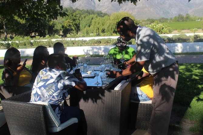 Shared Tour To The Wineries Stellenbosch Paarl + Cheese Tasting from Cape Town - Babylonstoren: farm gardens, Cape Dutch style, and glass-pane views