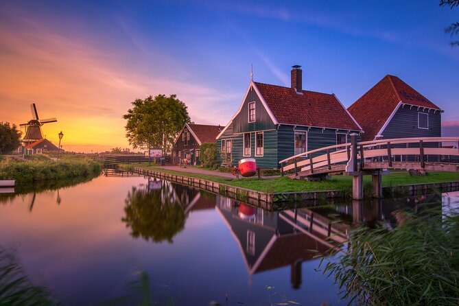 Zaanse Schans and Cheese Tasting Guided Tour from Amsterdam - Getting Started in Amsterdam: Meeting Point Matters
