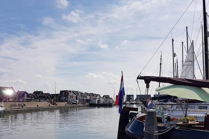 Zaanse Schans and Volendam Private Tour – Clogs, Cheese and More - Henri Willig cheese farm: Jersey cows, a milking robot, and tasting Gouda