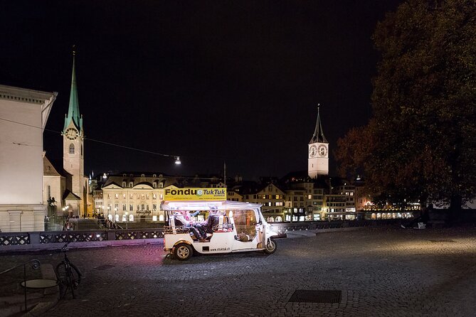 Zurich eTukTuk Private Tour - with Cheese Fondue and Wine - Church Stops: Fraumünster Stained Glass and Grossmünster Twin Towers