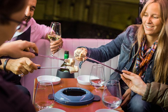Zurich eTukTuk Private Tour - with Cheese Fondue and Wine - Getting Aboard: Meeting Point, Ride Feel, and Timing