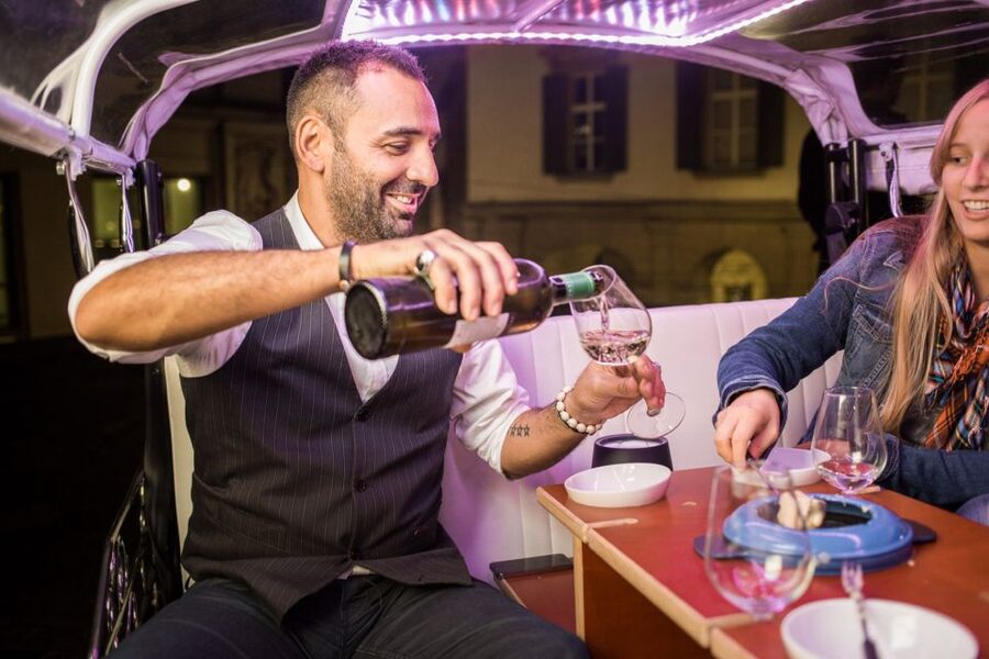Zurich: Swiss Cheese Fondue & Wine e-Tuk-Tuk City Tour - Ride setup: Three wheels, small alleys, and the Limmat views